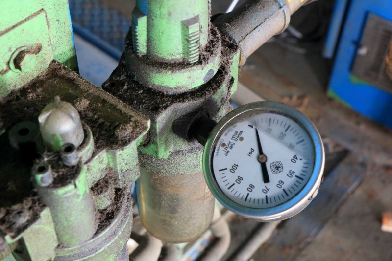 A pressure gauge, once no doubt important to an operator, now reads a perhaps symbolic zero. 